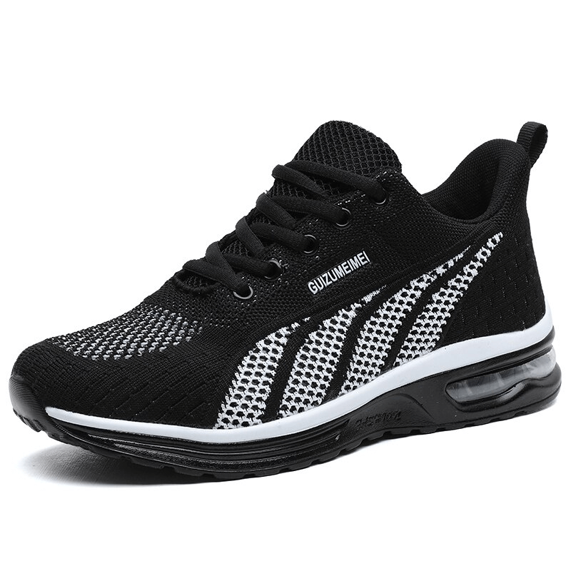 Stylish black women's mesh sneakers with lace-up closure and cushioning, perfect for active lifestyles.